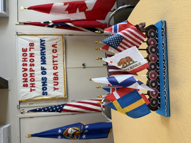 May 2026 meeting picture of flags and banner